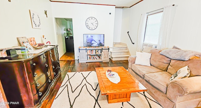 living room with crown molding and dark wood-type flooring