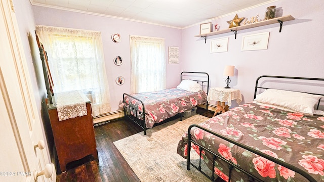 bedroom featuring a baseboard radiator, dark hardwood / wood-style floors, and ornamental molding