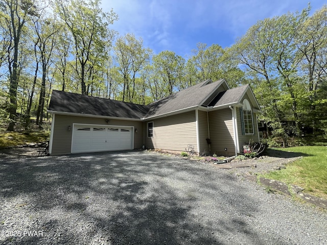 111 Bluestone Dr, Lords Valley, PA 18428 - view of property exterior with a garage and driveway