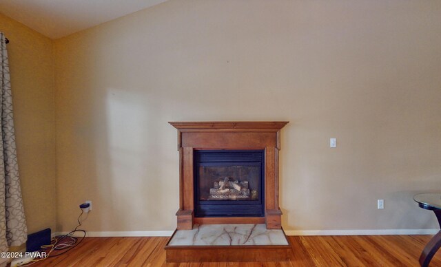 interior details featuring hardwood / wood-style flooring