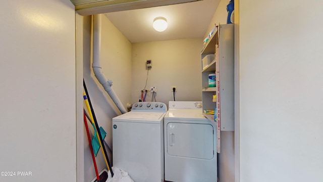 laundry area with washer and clothes dryer