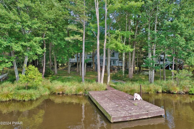 view of dock with a water view