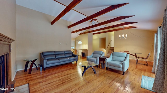 living room with vaulted ceiling with beams, wood-type flooring, and a notable chandelier