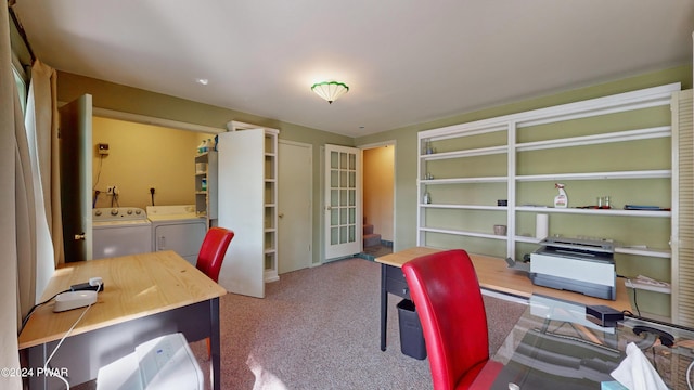 carpeted office featuring washer and dryer