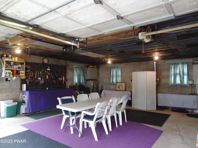 58 Branch Rd, Greentown, PA 18426 - dining space with concrete floors and concrete block wall