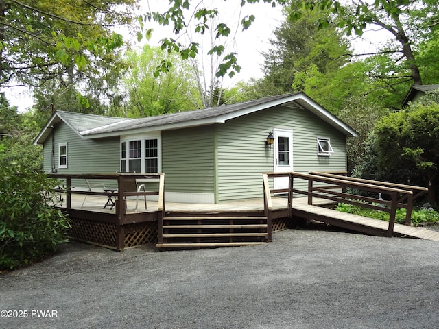 58 Branch Rd, Greentown, PA 18426 - rear view of house with a wooden deck