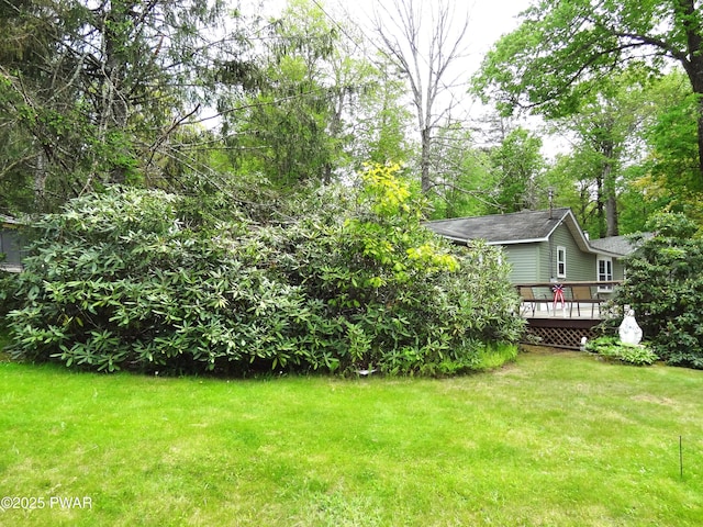 58 Branch Rd, Greentown, PA 18426 - view of green lawn with a wooden deck