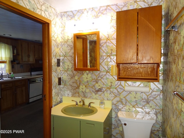 58 Branch Rd, Greentown, PA 18426 - bathroom featuring wallpapered walls, toilet, and vanity