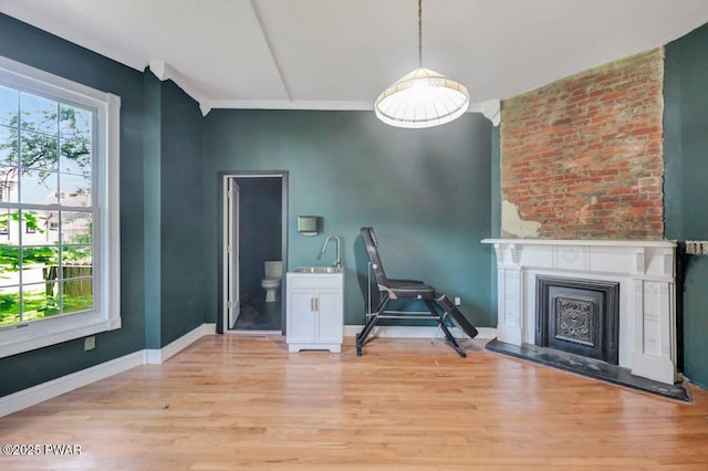 1642 Sanderson Ave, Scranton, PA 18509 - living area featuring light wood-style floors and a fireplace