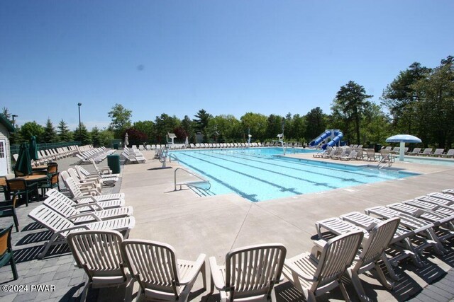 view of pool featuring a patio area