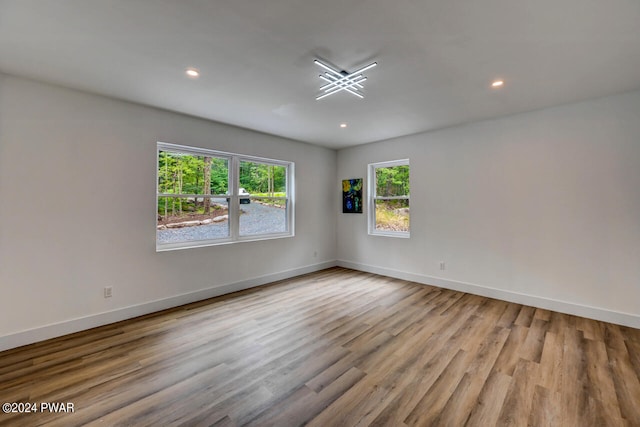 empty room with light hardwood / wood-style floors