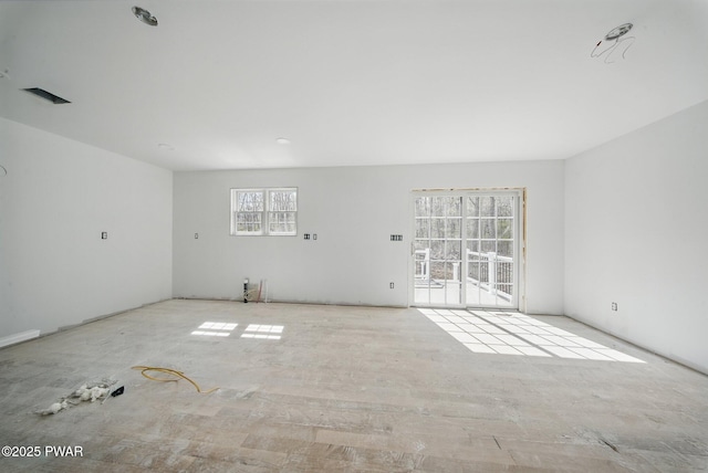 spare room featuring visible vents