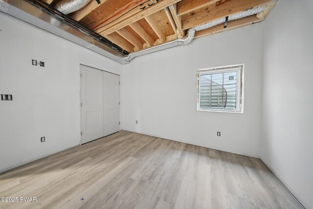 empty room featuring wood finished floors