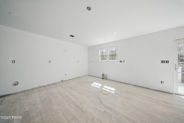 empty room featuring wood finished floors