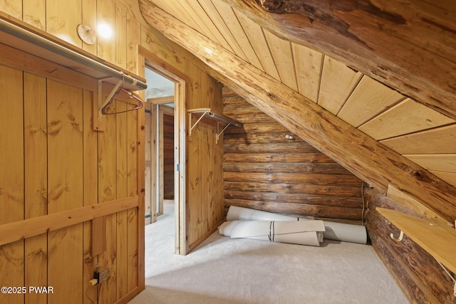 bonus room with rustic walls, carpet, and wooden ceiling