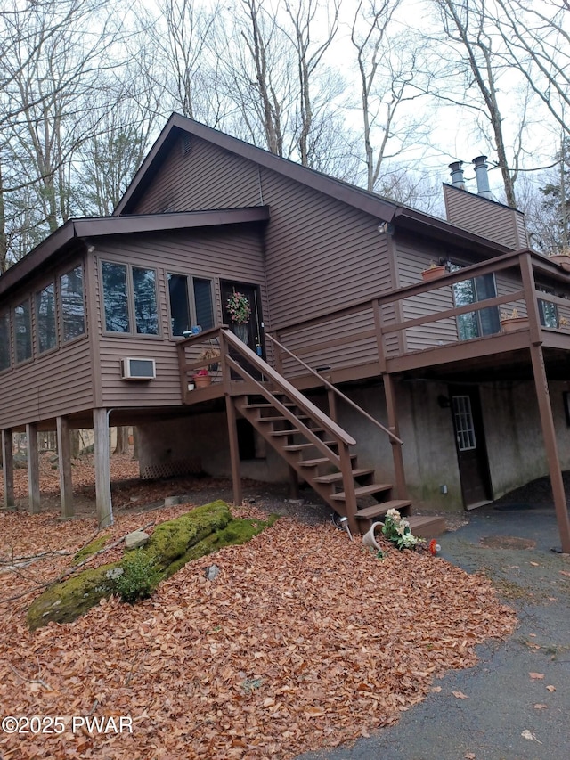 view of front of home featuring a wooden deck