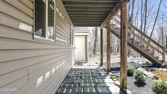 view of patio with stairway