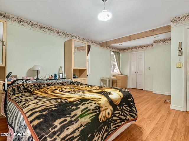 bedroom with light hardwood / wood-style floors