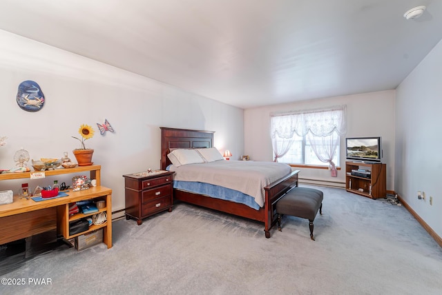 111 Babette Ct, Dingmans Ferry, PA 18328 - bedroom with a baseboard heating unit, light carpet, and baseboards