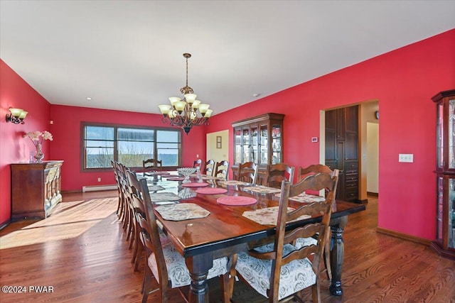 1075 Owego Tpke, Honesdale, PA 18431 - dining area featuring a chandelier, wood finished floors, and baseboard heating