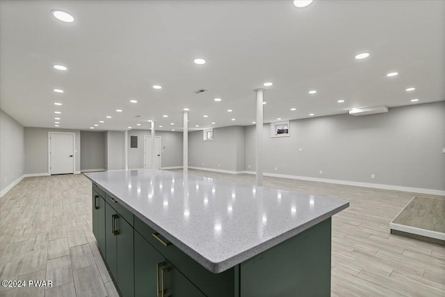 1075 Owego Tpke, Honesdale, PA 18431 - kitchen featuring green cabinetry, light wood-type flooring, a center island, open floor plan, and recessed lighting