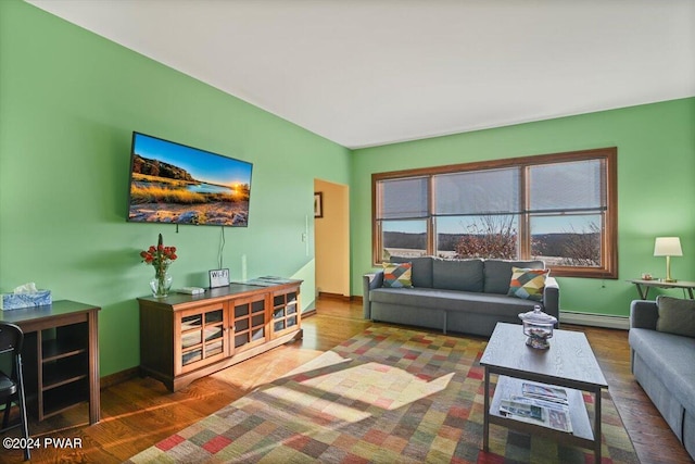1075 Owego Tpke, Honesdale, PA 18431 - living area with a baseboard heating unit and wood finished floors