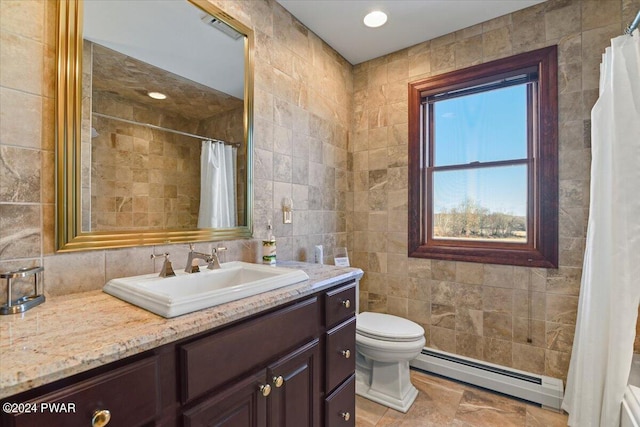1075 Owego Tpke, Honesdale, PA 18431 - bathroom featuring a baseboard heating unit, tile walls, vanity, a shower with shower curtain, and backsplash