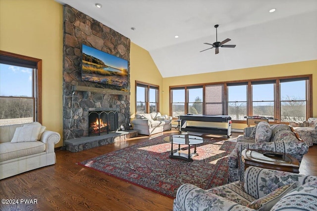 1075 Owego Tpke, Honesdale, PA 18431 - living room featuring a fireplace, wood finished floors, healthy amount of natural light, ceiling fan, and high vaulted ceiling