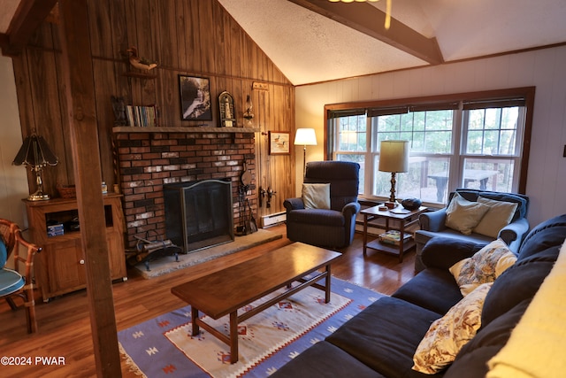 living room featuring a brick fireplace, dark hardwood / wood-style floors, a baseboard radiator, and vaulted ceiling