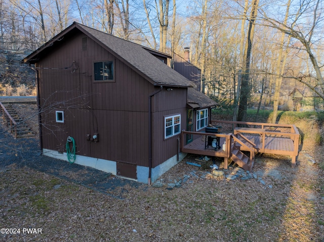 150 N Lake Dr, Dingmans Ferry, PA 18328 - view of home's exterior with roof with shingles and a deck
