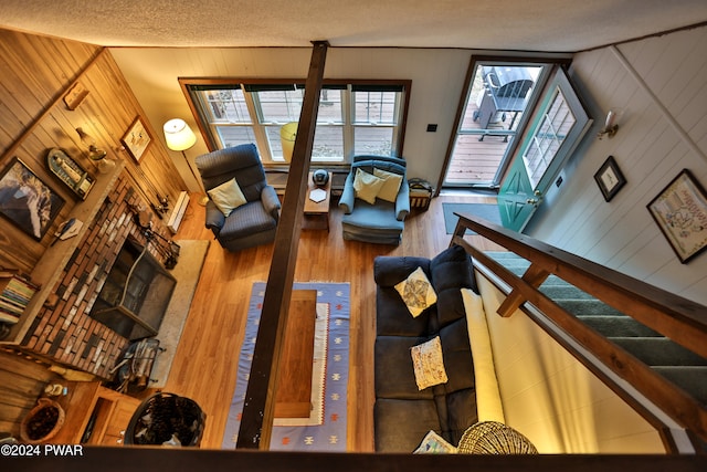 150 N Lake Dr, Dingmans Ferry, PA 18328 - living area featuring wood walls and wood finished floors