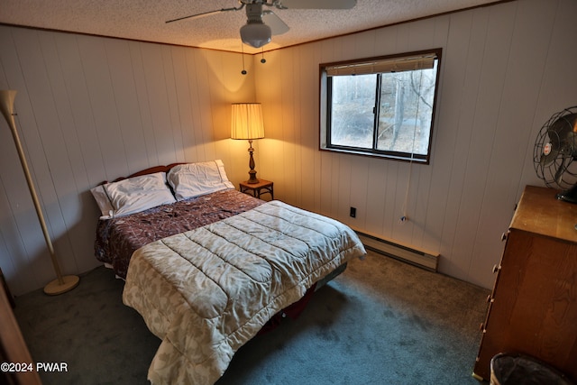 bedroom with ceiling fan, a baseboard radiator, a textured ceiling, and dark colored carpet