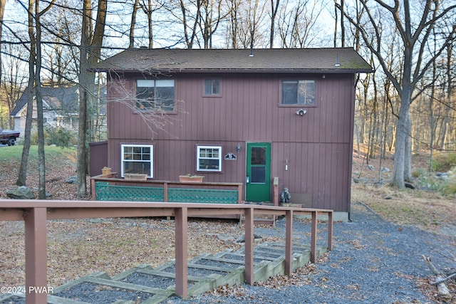 150 N Lake Dr, Dingmans Ferry, PA 18328 - rear view of house featuring a deck and roof with shingles