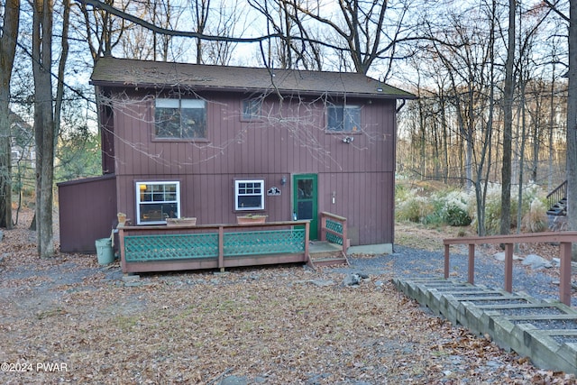 150 N Lake Dr, Dingmans Ferry, PA 18328 - rear view of house with a wooden deck and a shingled roof