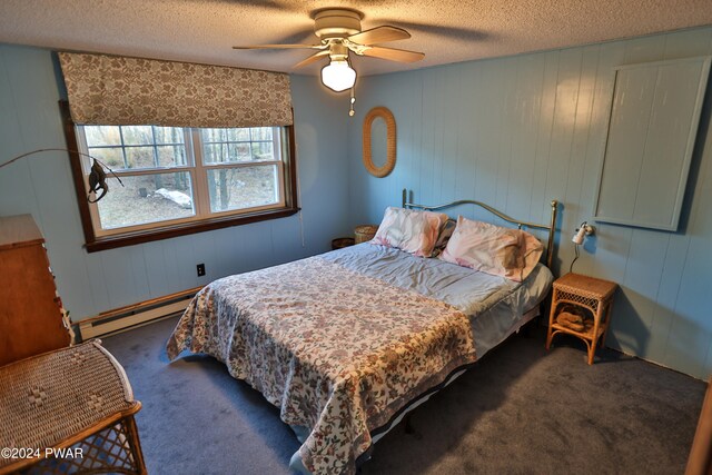 bedroom with dark colored carpet, a textured ceiling, a baseboard radiator, and ceiling fan