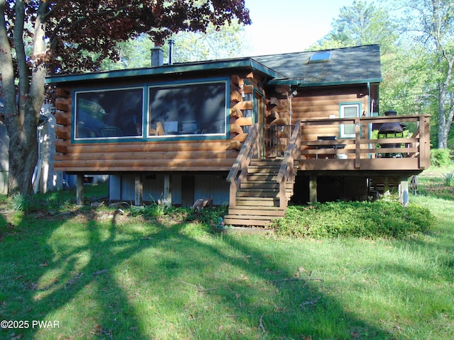 105 Leonard Ln, Paupack, PA 18451 - back of house with log exterior, a deck, a lawn, and stairs