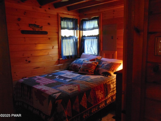 105 Leonard Ln, Paupack, PA 18451 - bedroom featuring wooden walls and beam ceiling