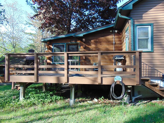 105 Leonard Ln, Paupack, PA 18451 - back of property with a wooden deck