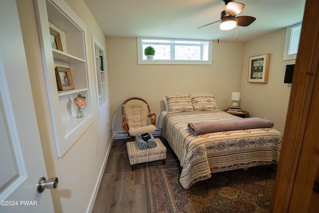 bedroom featuring hardwood / wood-style floors and ceiling fan