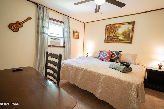 carpeted bedroom featuring ornamental molding, ceiling fan, and cooling unit