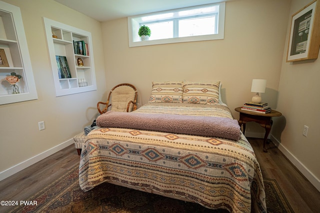 bedroom featuring dark wood-type flooring