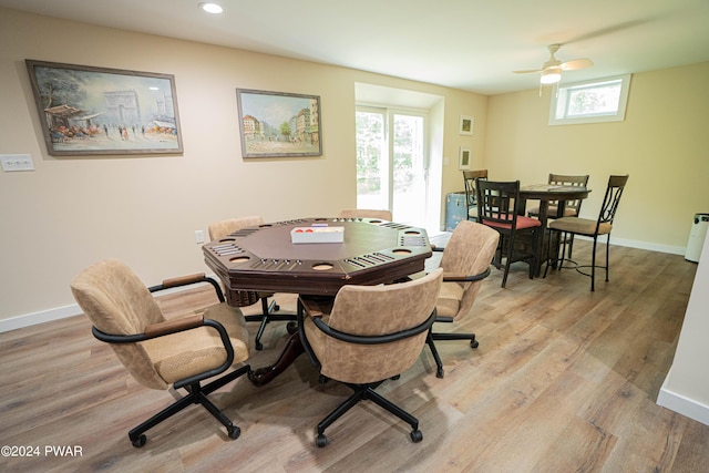 dining space featuring a wealth of natural light, ceiling fan, and light hardwood / wood-style floors