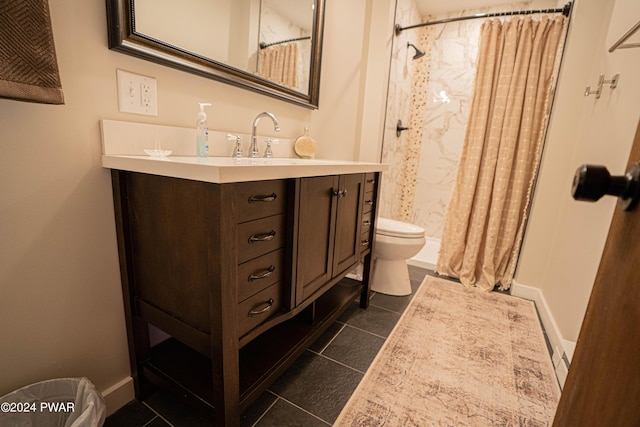 bathroom with tile patterned floors, vanity, toilet, and walk in shower