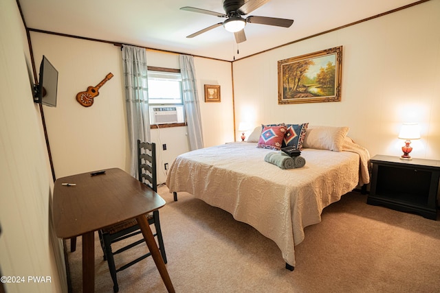 carpeted bedroom featuring ornamental molding, ceiling fan, and cooling unit