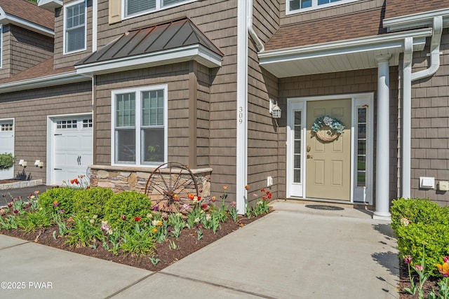 309 Braeburn Path, Matamoras, PA 18336 - doorway to property featuring a garage, roof with shingles, metal roof, and a standing seam roof