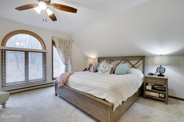 bedroom featuring ceiling fan, light colored carpet, a baseboard radiator, and multiple windows