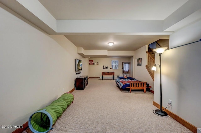 carpeted bedroom with baseboards