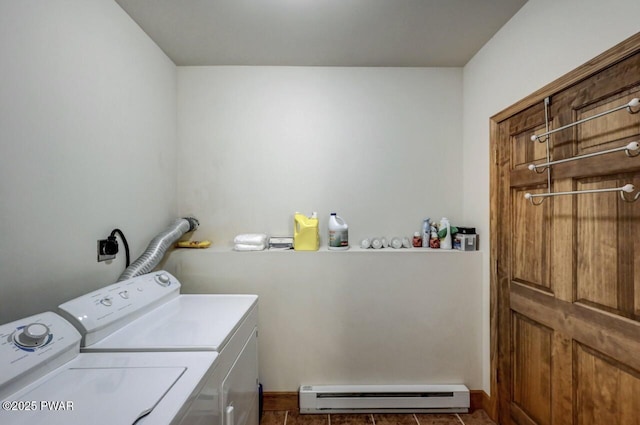 clothes washing area featuring a baseboard radiator, independent washer and dryer, and laundry area