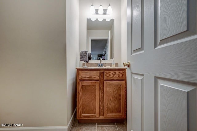 bathroom with tile patterned flooring and vanity