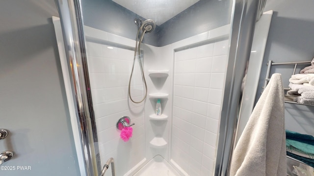 bathroom with a stall shower